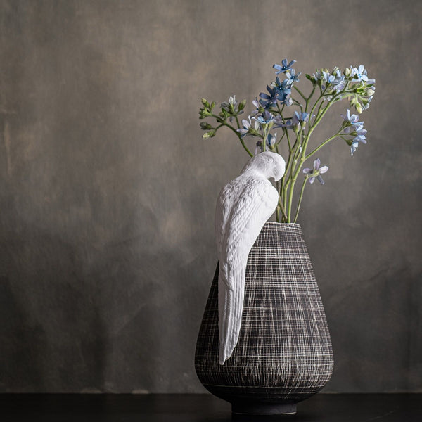 Perroquet en porcelaine